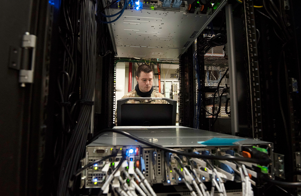 U.S. Air Force Staff Sgt. Christopher Luce works on a computer server at Rickenbacker Air National Guard Base, Ohio.