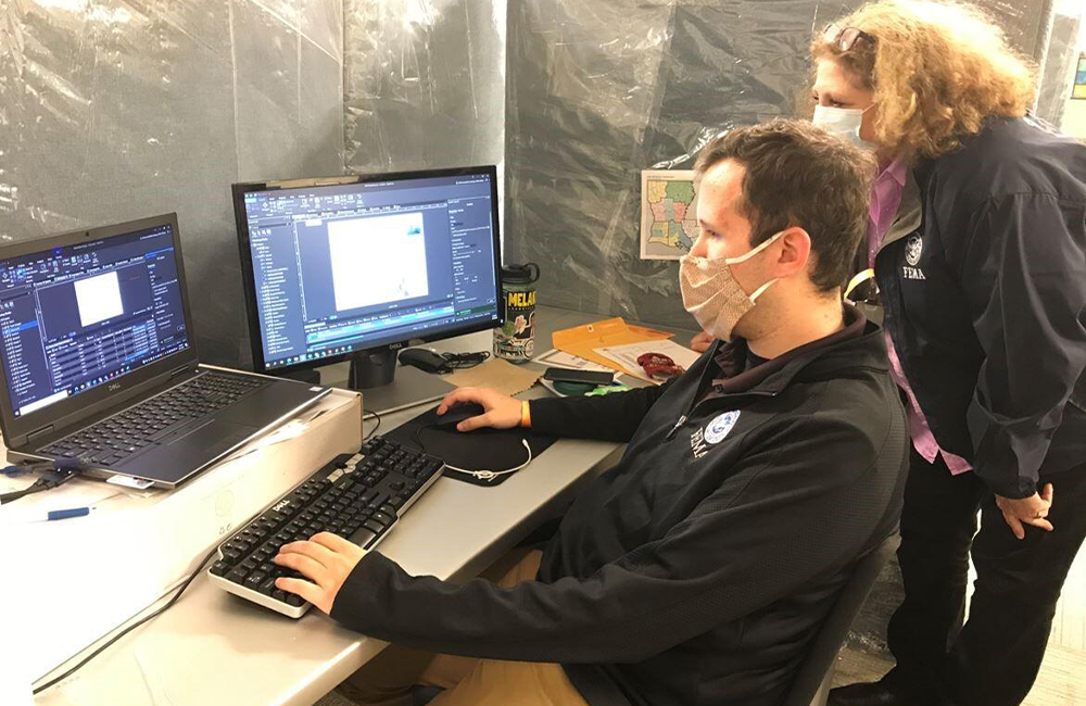 A FEMA geospatial information specialist provides critical information in preparation of Hurricane Delta’s landfall in 2020.