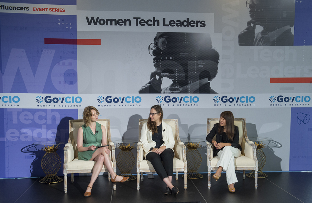 image of CMS Executive Director of Digital Services Andrea Fletcher and CISA Chief of Strategy, Policy and Plans Valerie C speak on a panel during the July 14, 2022 Women Tech Leaders event in Washington, DC.