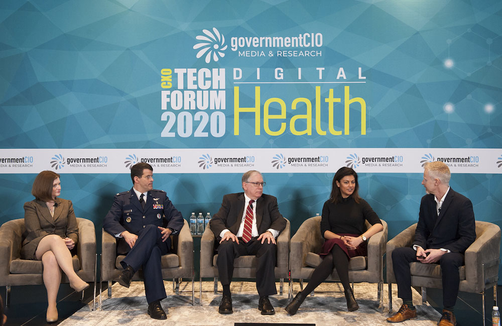 USDS Director Misu Tasnim, NIH Principal Deputy Director Lawrence Tabak, DHA Chief Medical Informatics Officer Thomas Cantilina and CVP Health Director Brenda Blunt (right to left) discuss human-centered design in data.