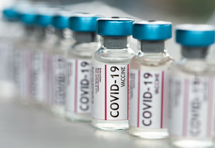 Covid-19 Coronavirus Vaccine vials in a row macro close up