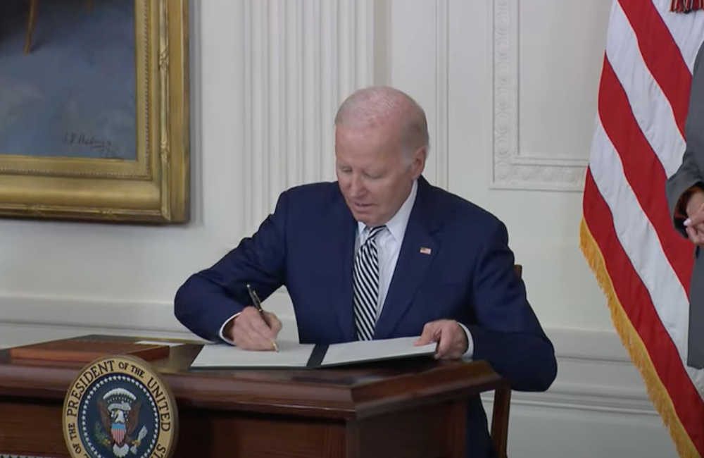 President Joe Biden signing executive order