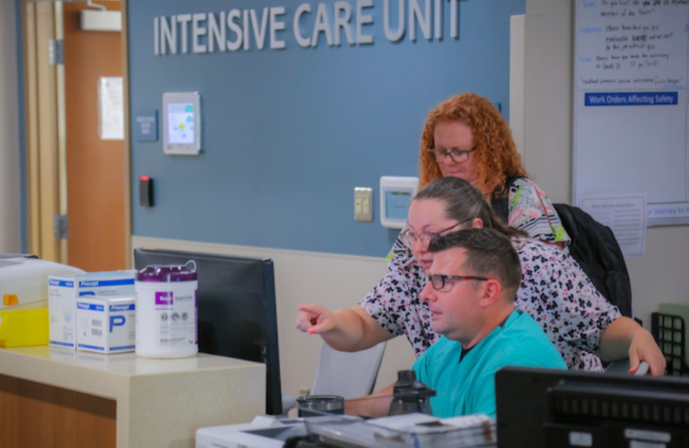 Teams of service members and civilians are helping the Blanchfield Army Community Hospital staff to implement MHS Genesis, June 7, 2023.