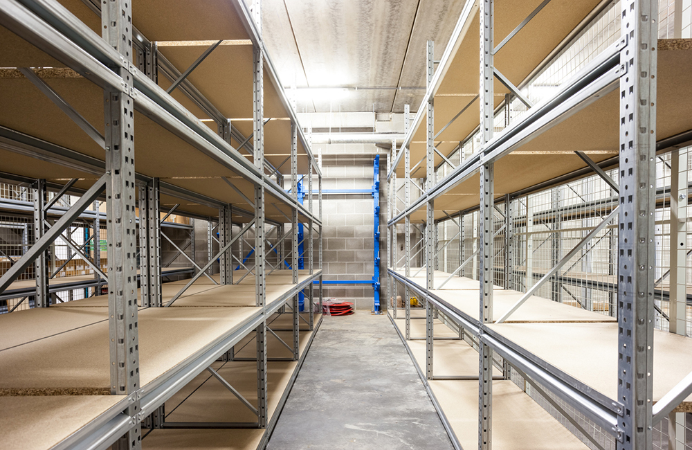 empty storage racks in a building with security