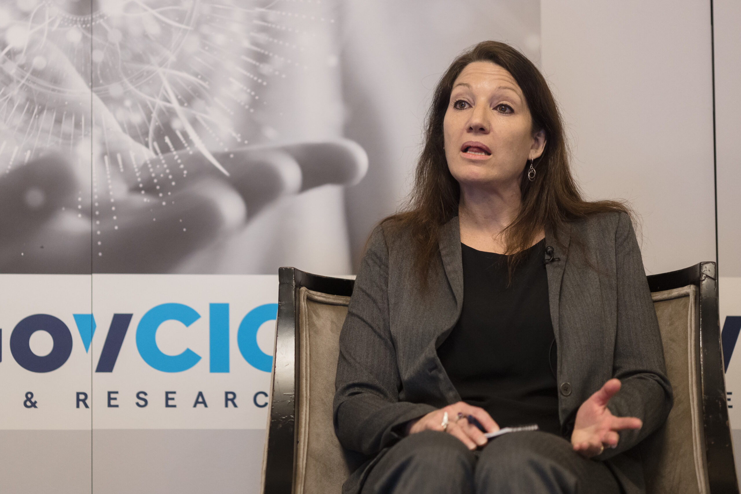 Kristen Honey, HHS CDO, sits at GovCIO Media & Research's Women Tech Leaders Summit during a panel discussion.