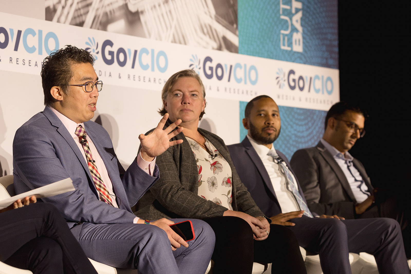 OPM's Taka Ariga, Innovation Directorate Army Recruiting Command's Col. Kris Saling, Department of Education's Davon Tyler and Microsoft Federal's Jay Bhalodia speak at the GovCIO Media & Research AI Summit in Tysons, Va. on Nov. 7.