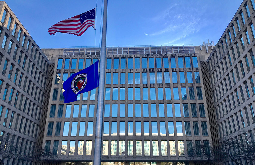 Flags are shown at OPM headquarters in D.C. in 2018.