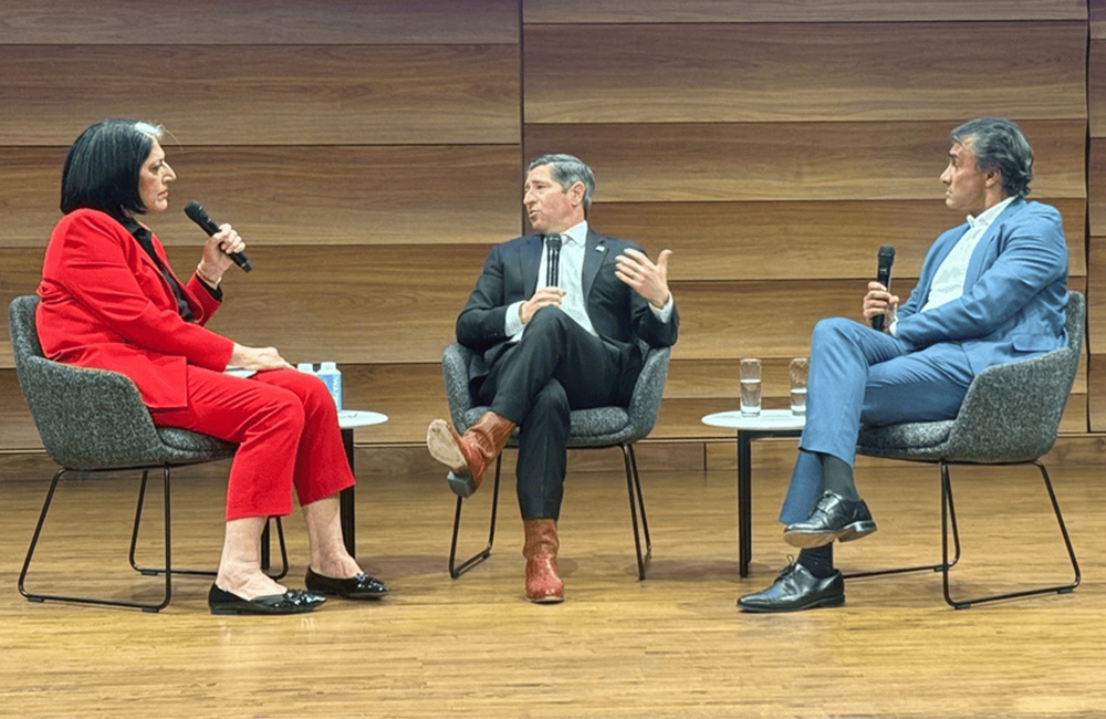 Washington AI Network's Tammy Haddan, Noble Reach's Arun Gupta and Office of Personnel Management's Scott Kupor speak during a live podcast recording on Jan. 14, 2026, in Washington, D.C.