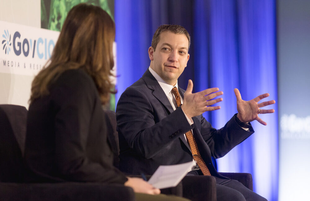 War Department Deputy Assistant Secretary for Science and Technology Foundations Jacob Glassman speaks at GovCIO Media & Research’s Defense IT Summit in Arlington, Virginia, on Feb. 26, 2026.