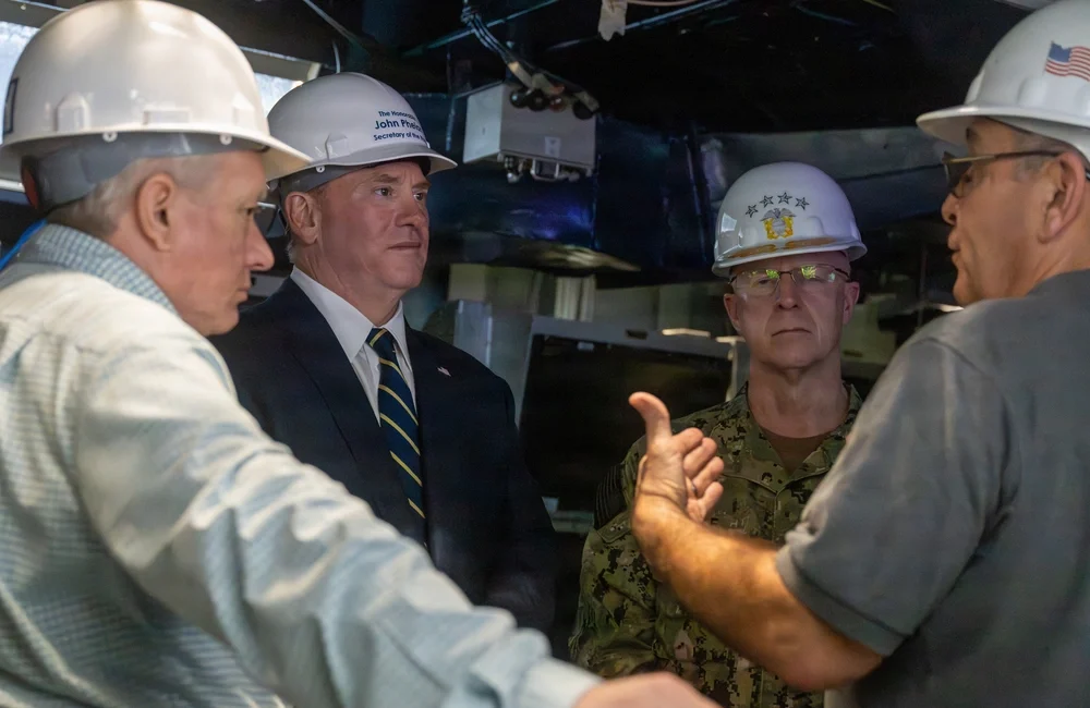 Navy Secretary John Phelan tours Ingalls Shipbuilding in Pascagoula, Mississippi, alongside Chief of Naval Operations Adm. Daryl Caudle and Commandant of the Marine Corps, Gen. Eric Smith, Jan. 7, 2026.