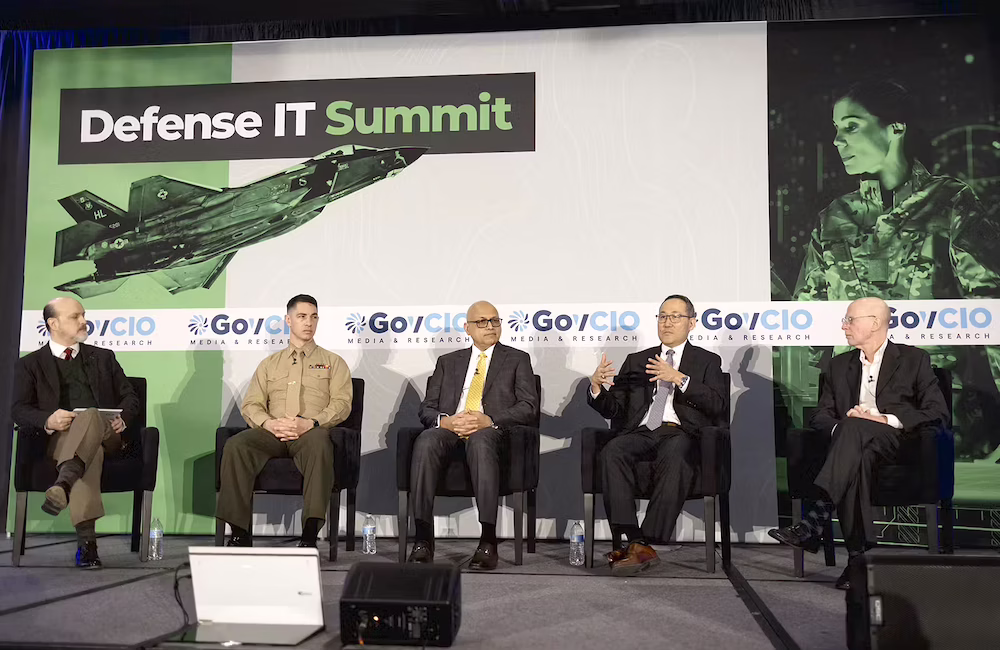 Marine Corps' Maj. Christopher Clark, Leidos' Srini Iyer and Guy Kiyokawa, and DHA's Jaques Reifman speak at GovCIO Media & Research's Defense IT Summit on Feb. 26, 2026, in Arlington, Virginia.